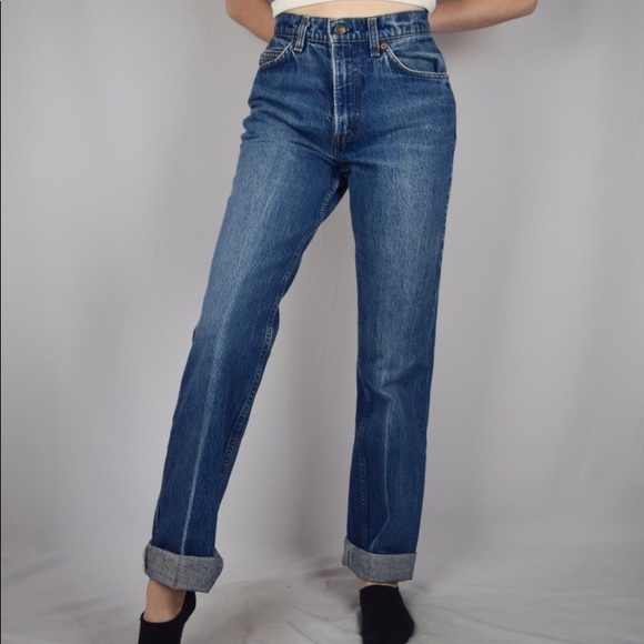 Vintage 80s Orange Tab Levi’s with a leather patch
